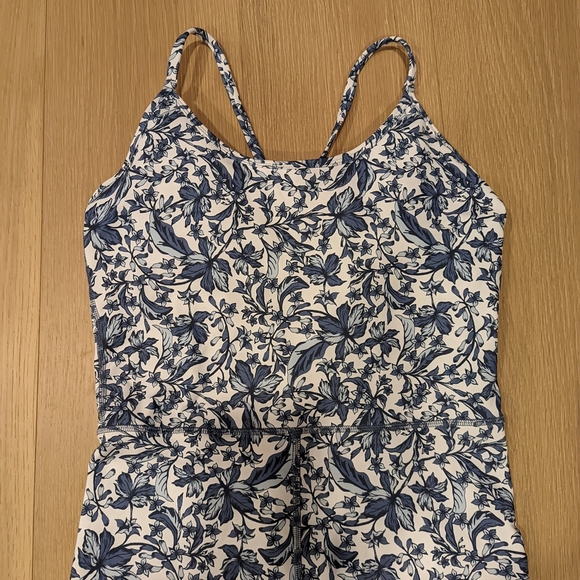 Floral Blue and White Athletic Romper - Picture 8 of 9